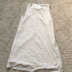 Nude sleeveless mini dress